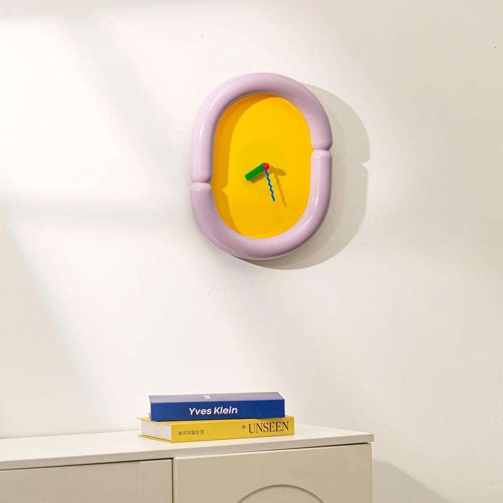 Horloge Murale Ovale Crème Design Nordique Acrylique